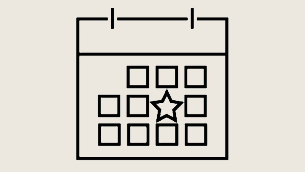 Ikonet viser en kalender med et gitter af firkanter, der repræsenterer enkelte dage. Et af felterne – placeret i den midterste række – indeholder en stjerne